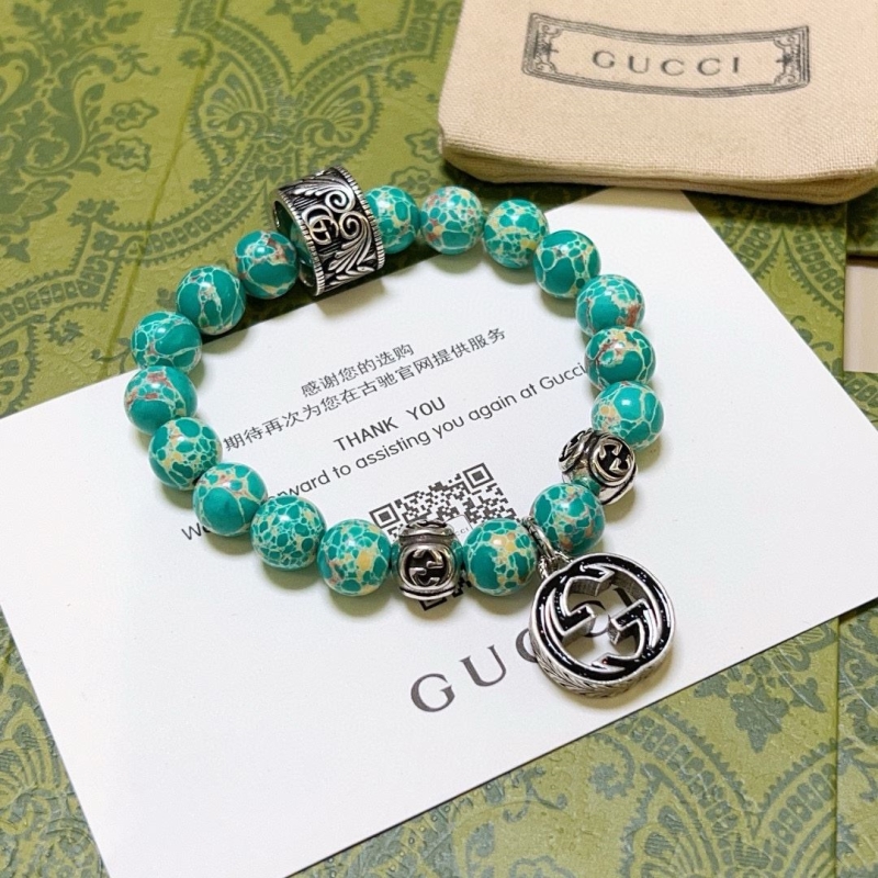 G*u*i bracelets